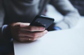 A man holding a mobile phone