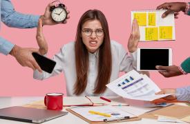 Woman employee frustrated by lots of different tasks being thrown at her