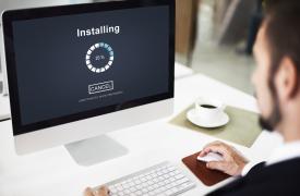 Desktop showing a program installing and the progress bar
